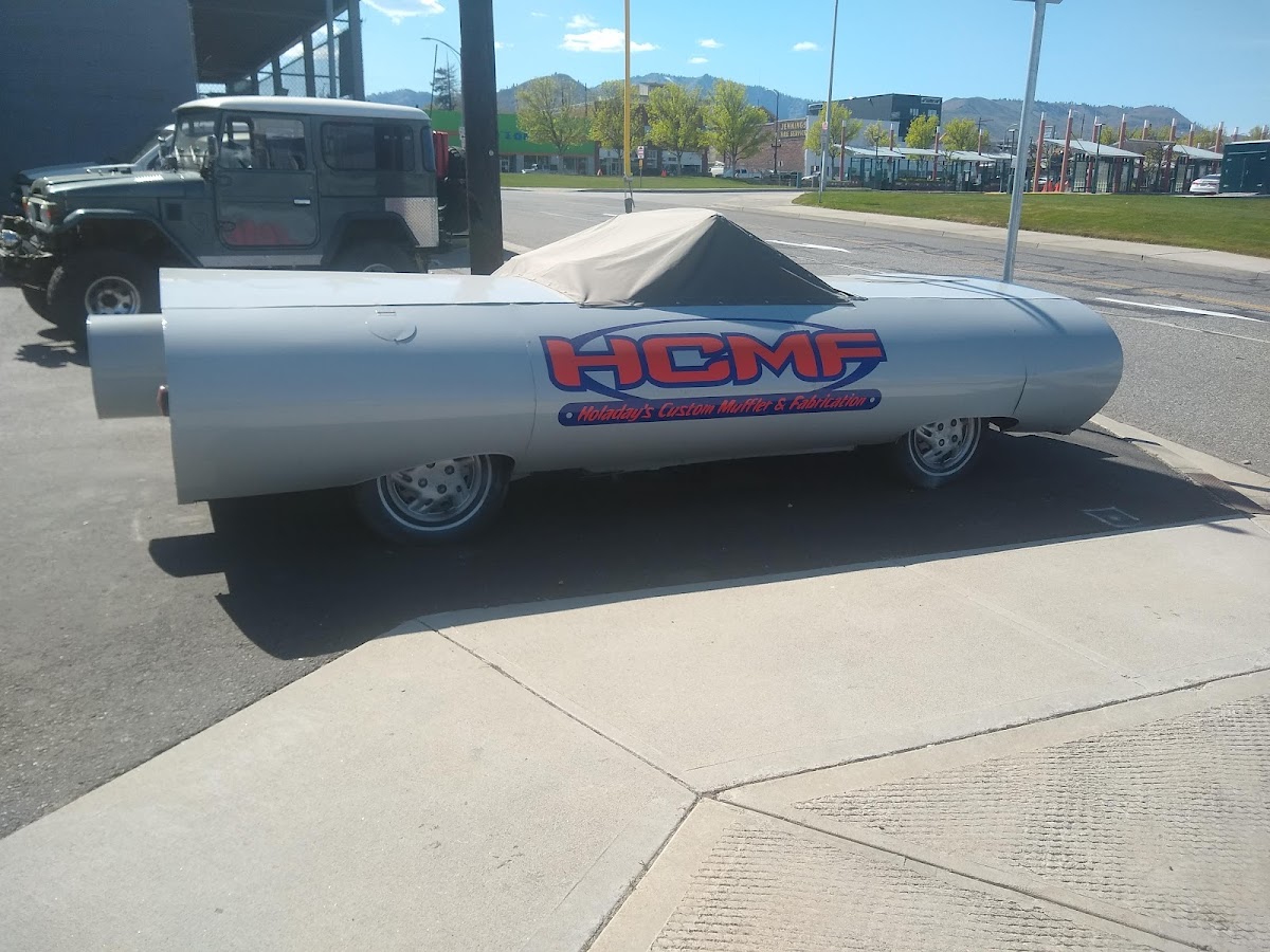 The HCMF muffler car, a full-size show car fabricated in the shape of a chrome muffler