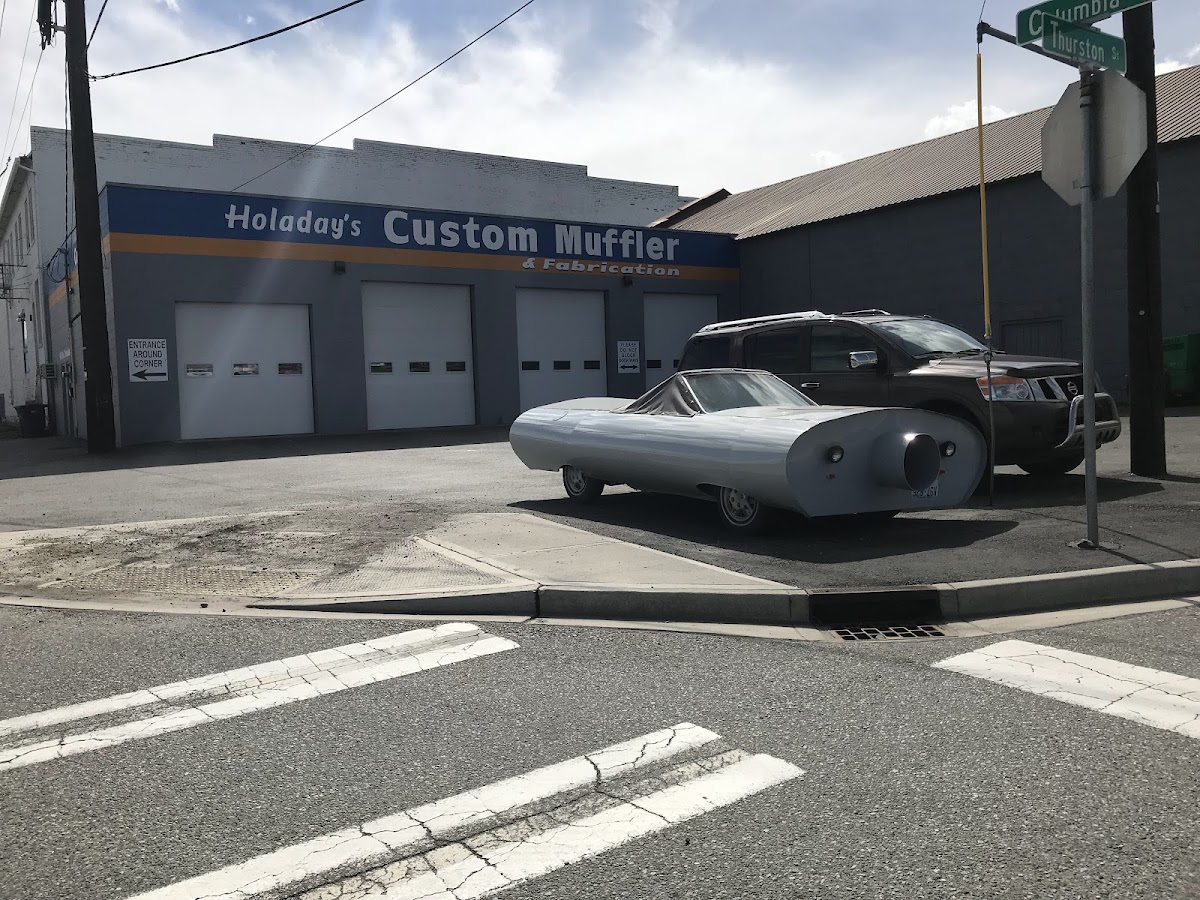 Wide corner view of the Holaday's storefront at Columbia and Thurston